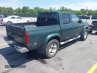 2000 Nissan Frontier XE with VIN 1N6ED27T2YC353126, listed as a IAAI auction lot 42092445 with 189,992 mi miles and . Bid and sale history available at DreamBid. Image 4.