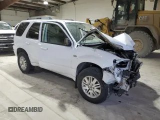 2005 Mercury Mariner Luxury z VIN 4M2CU57145DJ11612, wystawiony jako Copart lot #43980985 z przebiegiem 102 859 mil mil oraz Szkody całkowita. Historia ofert i sprzedaży dostępna na DreamBid. Obrazek 4.