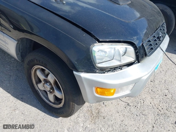 1998 Toyota RAV4 with VIN JT3GP10V7W7037711, listed as a IAAI auction lot 42081313 with 233,554 mi miles. Bid and sale history available at carsss.com. Image 13.
