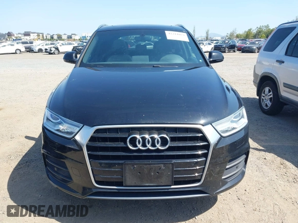 2017 Audi Q3 Premium with VIN WA1BCCFS5HR010731, listed as a IAAI auction lot 42211073 with 67,383 mi miles and . Bid and sale history available at DreamBid. Image 12.