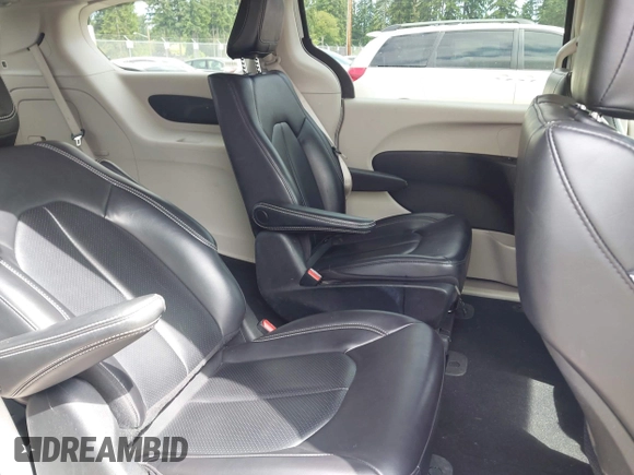 2023 Chrysler Pacifica Hybrid Touring L with VIN 2C4RC1L77PR541513, listed as a IAAI auction lot 42433421 with 53,979 mi miles and . Bid and sale history available at DreamBid. Image 8.