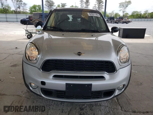 2014 MINI Countryman S with VIN WMWZC3C56EWP29211, listed as a Copart auction lot 52521145 with 91,396 mi miles and Salvage title. Bid and sale history available at DreamBid. Image 5.