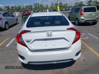 2020 Honda Civic LX with VIN 2HGFC2F61LH568767, listed as a IAAI auction lot 41909755 with 56,213 mi miles and . Bid and sale history available at DreamBid. Image 17.