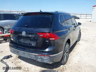 2018 Volkswagen Tiguan SEL with VIN 3VV3B7AX2JM165849, listed as a IAAI auction lot 41827856 with 114,238 mi miles. Bid and sale history available at carsss.com. Image 4.