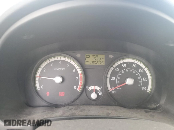 2009 Kia Rio LX with VIN KNADE223496469797, listed as a Copart auction lot 71005774 with 130,675 mi miles and Salvage Title. Bid and sale history available at DreamBid. Image 9.