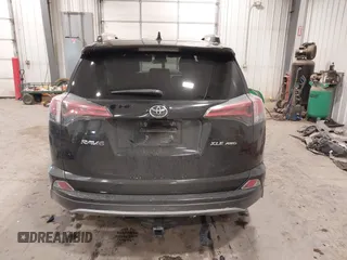 2018 Toyota RAV4 XLE with VIN 2T3RFREV3JW817989, listed as a IAAI auction lot 41636957 with 182,265 mi miles. Bid and sale history available at carsss.com. Image 17.