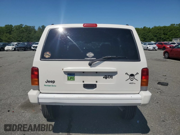 1998 Jeep Cherokee Sport with VIN 1J4FJ68S8WL116368, listed as a Copart auction lot 59228735 with 113,546 mi miles and Salvage title. Bid and sale history available at DreamBid. Image 6.