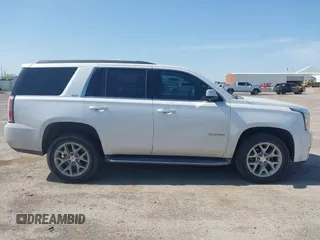 2017 GMC Yukon SLT z VIN 1GKS1BKC2HR378437, wystawiony jako IAAI lot #41923260 z przebiegiem 127 356 mil mil oraz . Historia ofert i sprzedaży dostępna na DreamBid. Obrazek 13.
