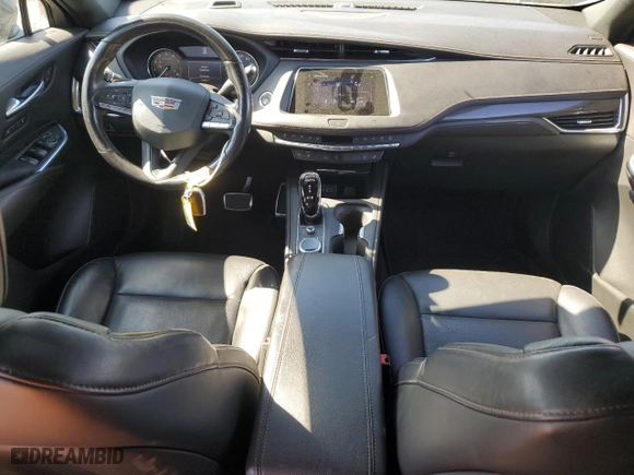 2020 Cadillac XT4 FWD Sport with VIN 1GYFZER44LF145993, listed as a Copart auction lot 77881204 with 43,606 mi miles and Salvage Title. Bid and sale history available at carsss.com. Image 8.
