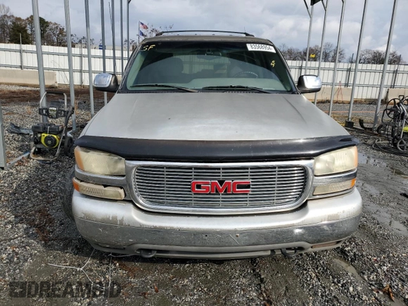 2001 GMC Yukon SLT z VIN 1GKEC13T51J145673, wystawiony jako Copart lot #83568954 z przebiegiem 310 415 mil mil oraz Szkoda całkowita • Salvage title. Historia ofert i sprzedaży dostępna na DreamBid. Obrazek 5.