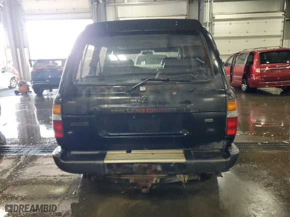 1997 Toyota Land Cruiser with VIN JT3HJ85J0V0184304, listed as a Copart auction lot 72438414 with 310,213 mi miles and Clean Title. Bid and sale history available at carsss.com. Image 6.
