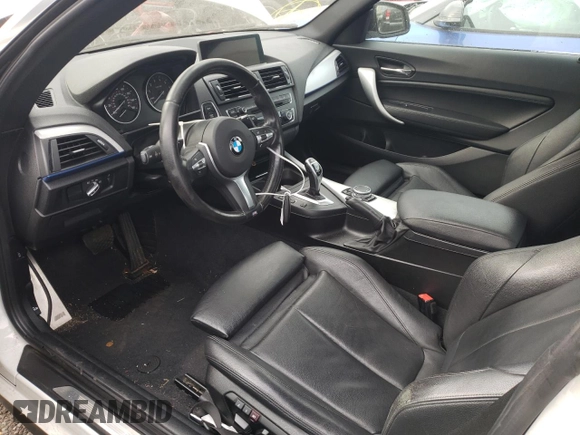 2015 BMW 2 Series 228i xDrive with VIN WBA1F7C58FV367269, listed as a Copart auction lot 87902715 with 67,151 mi miles and Salvage Title. Bid and sale history available at carsss.com. Image 7.