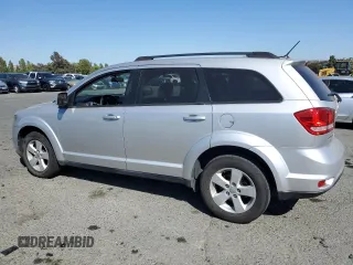 2012 Dodge Journey SXT z VIN 3C4PDDBG0CT293331, wystawiony jako Copart lot #62602995 z przebiegiem 185 605 mil mil oraz Szkoda całkowita • Salvage title. Historia ofert i sprzedaży dostępna na DreamBid. Obrazek 2.