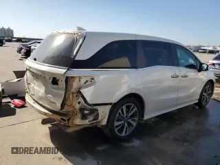 2023 Honda Odyssey Touring with VIN 5FNRL6H80PB024709, listed as a Copart auction lot 47594375 with Not Provided miles and Salvage Title. Bid and sale history available at DreamBid. Image 3.
