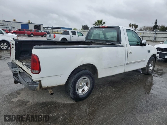 2002 Ford F-150 XL with VIN 1FTRF17W12NB04640, listed as a Copart auction lot 49535475 with 306,294 mi miles and Clean Title. Bid and sale history available at carsss.com. Image 3.