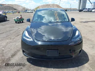 2023 Tesla Model Y Long Range with VIN 7SAYGDEE0PA183891, listed as a IAAI auction lot 42205573 with 41,273 mi miles and . Bid and sale history available at DreamBid. Image 12.