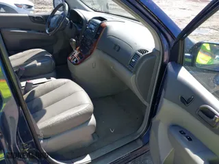 2006 Kia Sedona LX with VIN KNDMB233066092696, listed as a IAAI auction lot 41834873 with 184,114 mi miles. Bid and sale history available at carsss.com. Image 5.