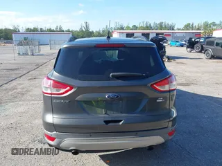 2016 Ford Escape SE with VIN 1FMCU9GX3GUB78749, listed as a IAAI auction lot 42030262 with 93,365 mi miles. Bid and sale history available at carsss.com. Image 16.
