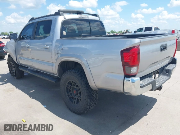 2018 Toyota Tacoma SR with VIN 3TMCZ5AN2JM172829, listed as a IAAI auction lot 42073847 with 136,671 mi miles and . Bid and sale history available at carsss.com. Image 3.