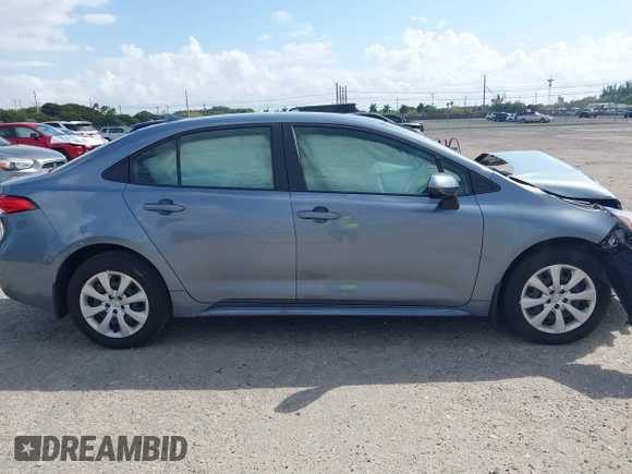 2023 Toyota Corolla Hybrid LE with VIN JTDBCMFE8PJ010693, listed as a IAAI auction lot 41736641 with 10,751 mi miles. Bid and sale history available at carsss.com. Image 14.