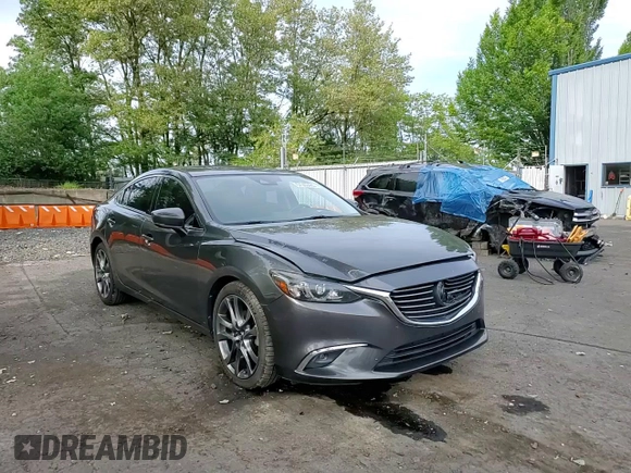 2017 Mazda 6 Grand Touring с VIN JM1GL1W55H1140064, выставлен на аукционе Copart как лот 57503425 с пробегом 74 304 миль миль и Списание • Salvage title. История ставок и продаж доступна на DreamBid. Изображение 13.