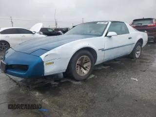 1992 Pontiac Firebird z VIN 1G2FS23T5NL219097, wystawiony jako Copart lot #44827185 z przebiegiem 118 250 mil mil oraz Czysty tytuł • Clean title. Historia ofert i sprzedaży dostępna na DreamBid. Obrazek 1.
