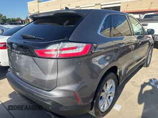 2021 Ford Edge Titanium with VIN 2FMPK3K96MBA51234, listed as a IAAI auction lot 42886659 with 74,183 mi miles and . Bid and sale history available at DreamBid. Image 15.
