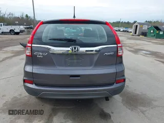 2015 Honda CR-V LX with VIN 5J6RM4H34FL031089, listed as a IAAI auction lot 42123159 with 74,566 mi miles and . Bid and sale history available at DreamBid. Image 16.