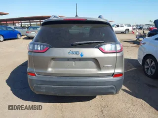 2019 Jeep Cherokee Latitude with VIN 1C4PJLCB2KD474165, listed as a IAAI auction lot 42100594 with 91,363 mi miles and . Bid and sale history available at DreamBid. Image 16.