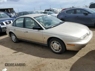 1996 Saturn SL with VIN 1G8ZK5277TZ318927, listed as a Copart auction lot 69162164 with 87,447 mi miles and Clean title. Bid and sale history available at DreamBid. Image 5.