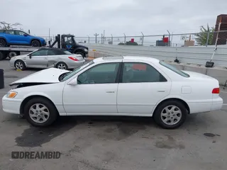 2000 Toyota Camry LE z VIN JT2BF28K3Y0289145, wystawiony jako IAAI lot #42455085 z przebiegiem 202 809 mil mil oraz . Historia ofert i sprzedaży dostępna na DreamBid. Obrazek 14.