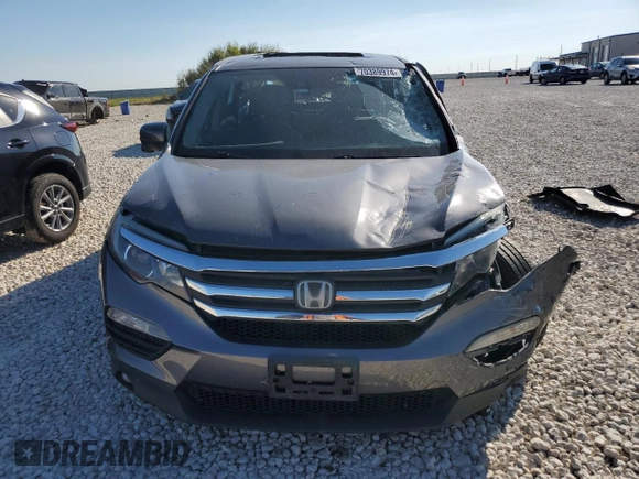 2018 Honda Pilot EX-L с VIN 5FNYF5H6XJB008231, выставлен на аукционе Copart как лот 70389974 с пробегом Не указан миль и Списание • Salvage title. История ставок и продаж доступна на DreamBid. Изображение 5.