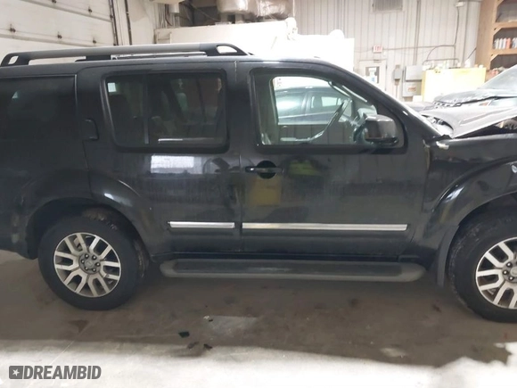2012 Nissan Pathfinder SV with VIN 5N1AR1NB8CC633788, listed as a IAAI auction lot 41476990 with 167,444 mi miles. Bid and sale history available at carsss.com. Image 13.