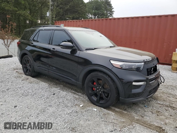 2020 Ford Explorer ST with VIN 1FM5K8GC2LGC73205, listed as a Copart auction lot 51080725 with 128,257 mi miles and Salvage Title. Bid and sale history available at DreamBid. Image 4.
