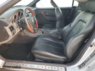 2001 Mercedes-Benz SLK-Class with VIN WDBKK65F31F230678, listed as a Copart auction lot 84119664 with 94,941 mi miles and Salvage Title. Bid and sale history available at carsss.com. Image 7.