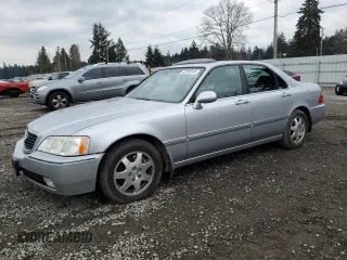 2002 Acura RL with VIN JH4KA96682C010796, listed as a Copart auction lot 42249145 with 246,683 mi miles and Salvage title. Bid and sale history available at DreamBid. Image 1.