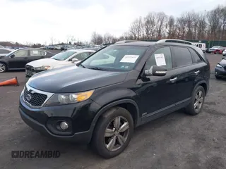 2013 Kia Sorento EX with VIN 5XYKUDA27DG413537, listed as a IAAI auction lot 40991803 with 163,534 mi miles. Bid and sale history available at carsss.com. Image 18.