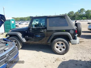 2009 Jeep Wrangler X with VIN 1J4FA24179L711352, listed as a IAAI auction lot 42577898 with 133,309 mi miles and . Bid and sale history available at DreamBid. Image 14.