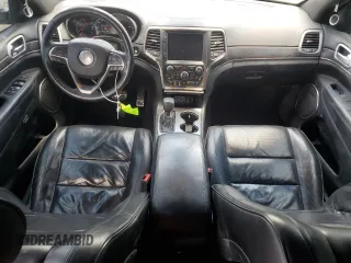 2018 Jeep Grand Cherokee High Altitude with VIN 1C4RJFCG5JC179040, listed as a Copart auction lot 61540625 with 135,310 mi miles and Salvage title. Bid and sale history available at DreamBid. Image 8.