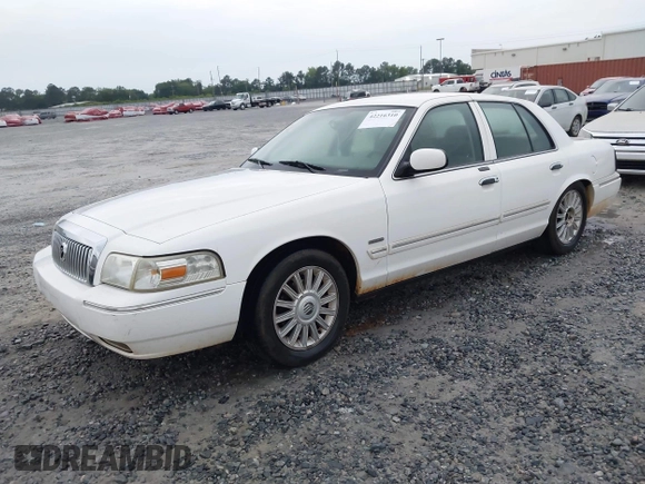 2010 Mercury Grand Marquis LS z VIN 2MEBM7FV5AX606873, wystawiony jako IAAI lot #42216310 z przebiegiem 198 896 mil mil oraz . Historia ofert i sprzedaży dostępna na DreamBid. Obrazek 2.