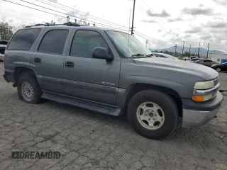 2002 Chevrolet Tahoe LS with VIN 1GNEC13T22R268336, listed as a Copart auction lot 50947675 with 238,425 mi miles and Salvage title. Bid and sale history available at DreamBid. Image 4.