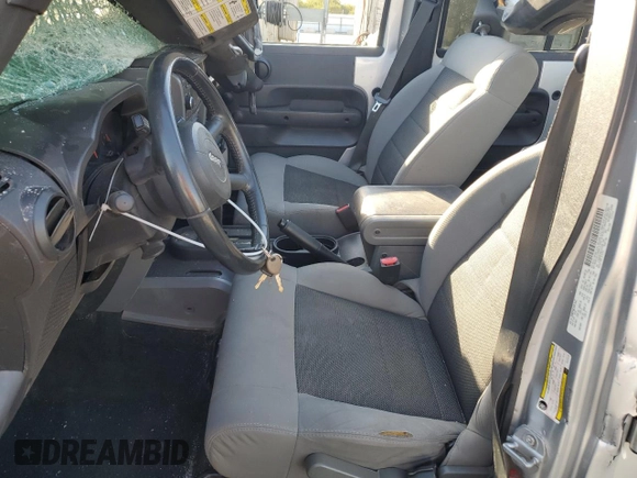 2008 Jeep Wrangler Unlimited X with VIN 1J4GB391X8L515128, listed as a Copart auction lot 74950764 with 188,884 mi miles and Salvage Title. Bid and sale history available at DreamBid. Image 7.