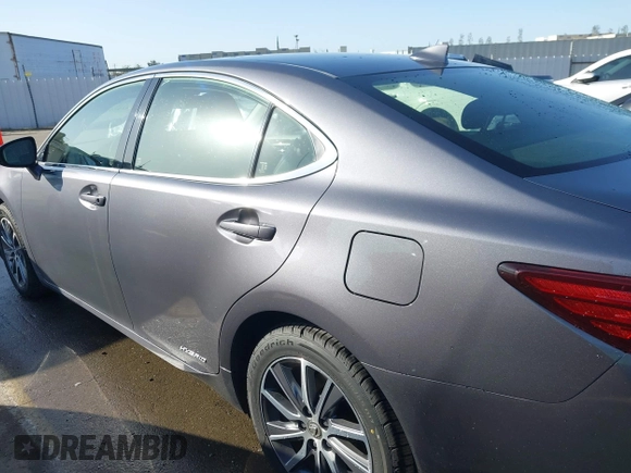 2016 Lexus ES 300h z VIN JTHBW1GG6G2108510, wystawiony jako IAAI lot #41959175 z przebiegiem 142 882 mil mil oraz . Historia ofert i sprzedaży dostępna na DreamBid. Obrazek 14.
