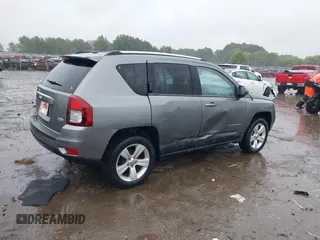 2014 Jeep Compass Latitude with VIN 1C4NJCEB2ED522109, listed as a IAAI auction lot 40282558 with 168,954 mi miles and . Bid and sale history available at carsss.com. Image 4.