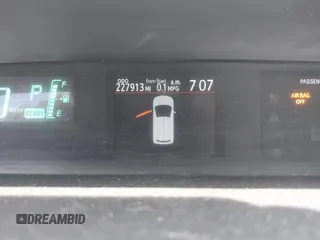 2012 Toyota Prius One z VIN JTDKDTB36C1009273, wystawiony jako IAAI lot #42454213 z przebiegiem 227 913 mil mil oraz . Historia ofert i sprzedaży dostępna na DreamBid. Obrazek 7.
