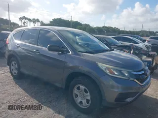 2015 Honda CR-V LX with VIN 2HKRM3H34FH510312, listed as a IAAI auction lot 41952816 with 111,712 mi miles and . Bid and sale history available at carsss.com. Image 1.