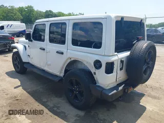 2021 Jeep Wrangler Unlimited Sahara with VIN 1C4HJXEN1MW618508, listed as a IAAI auction lot 42639515 with 39,747 mi miles and . Bid and sale history available at DreamBid. Image 3.