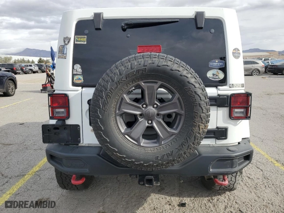2017 Jeep Wrangler Unlimited Rubicon with VIN 1C4BJWFG8HL620120, listed as a Copart auction lot 51508635 with 82,901 mi miles and Salvage Title. Bid and sale history available at carsss.com. Image 6.