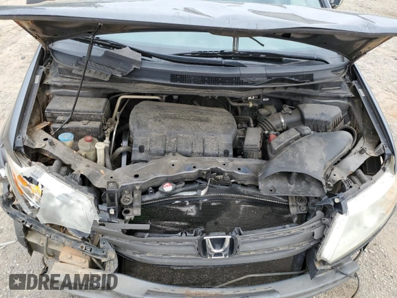2012 Honda Odyssey Touring with VIN 5FNRL5H96CB045514, listed as a Copart auction lot 54698355 with 217,787 mi miles and Clean Title. Bid and sale history available at DreamBid. Image 12.