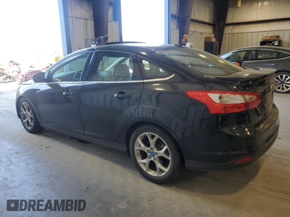 2013 Ford Focus Titanium with VIN 1FADP3J29DL193550, listed as a Copart auction lot 48848985 with 159,294 mi miles and Salvage Title. Bid and sale history available at carsss.com. Image 2.